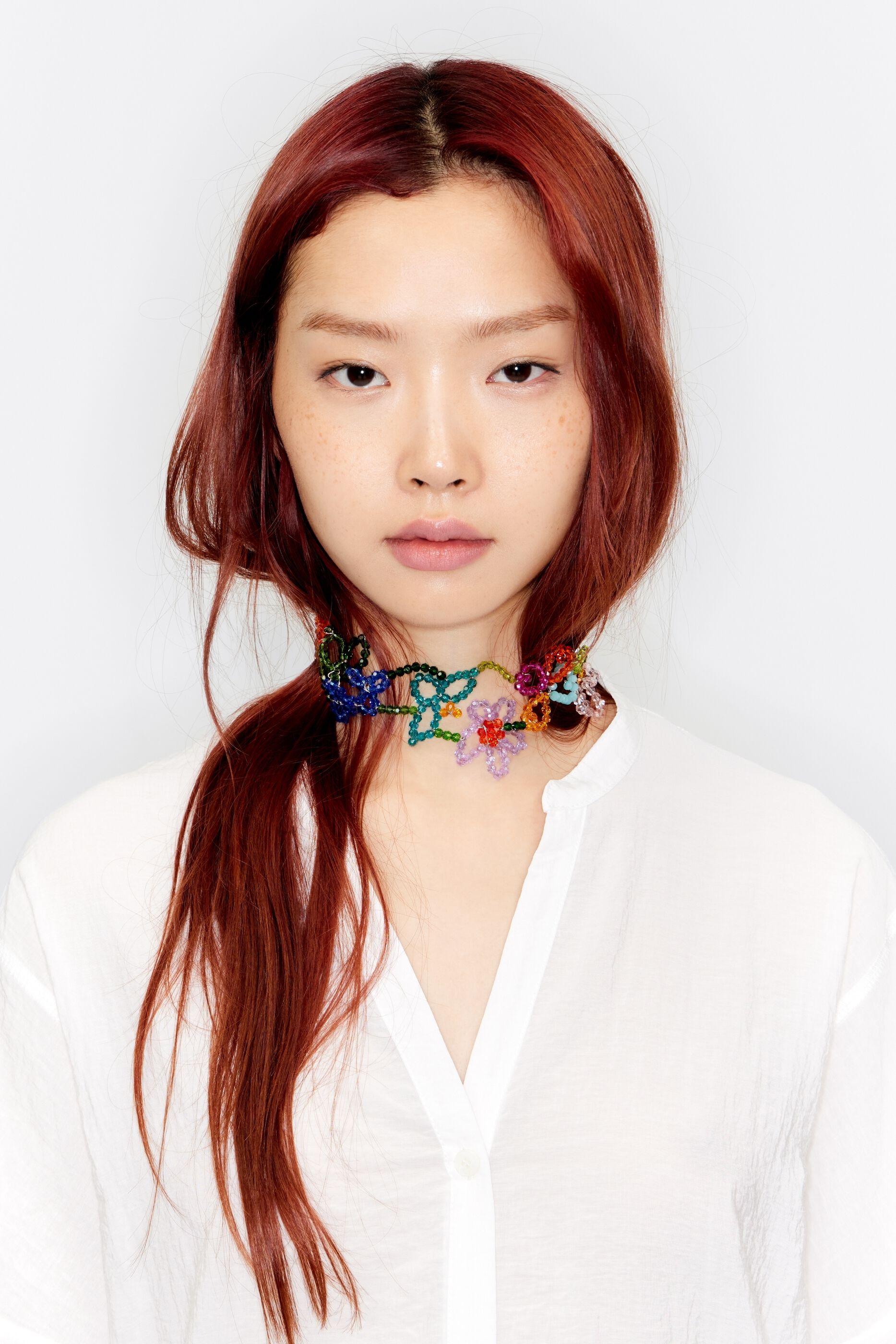 Choker necklace with flowers and multicolored crystals