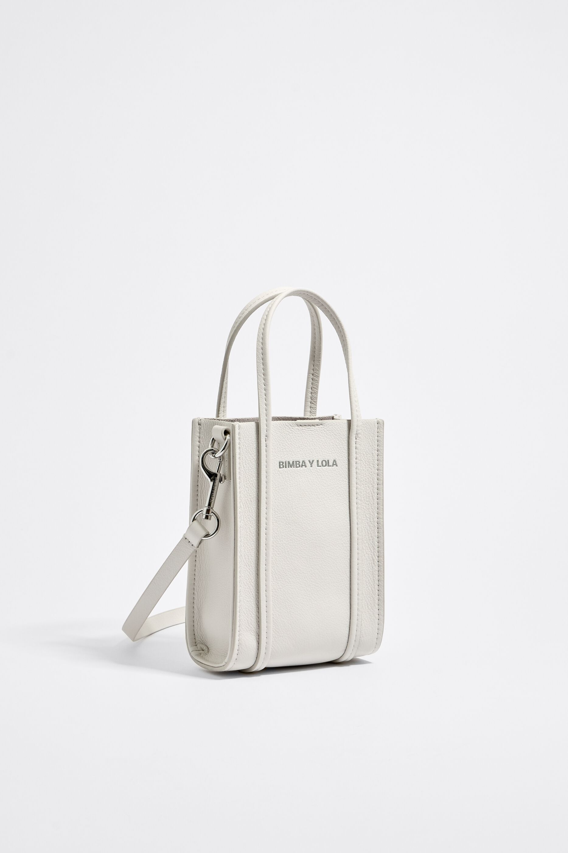 XS white off-leather crossbody bag