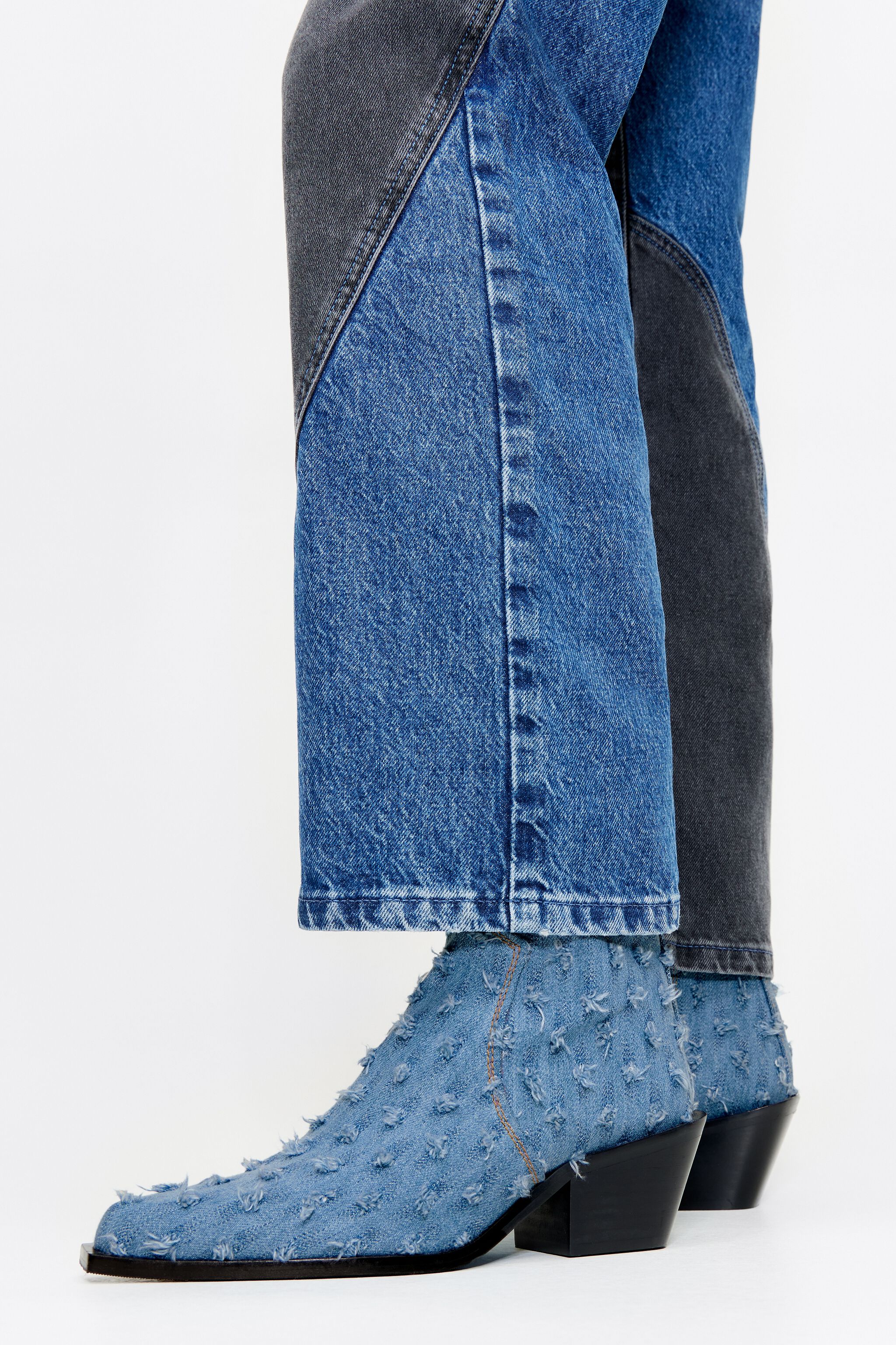 Blue denim cowboy boot