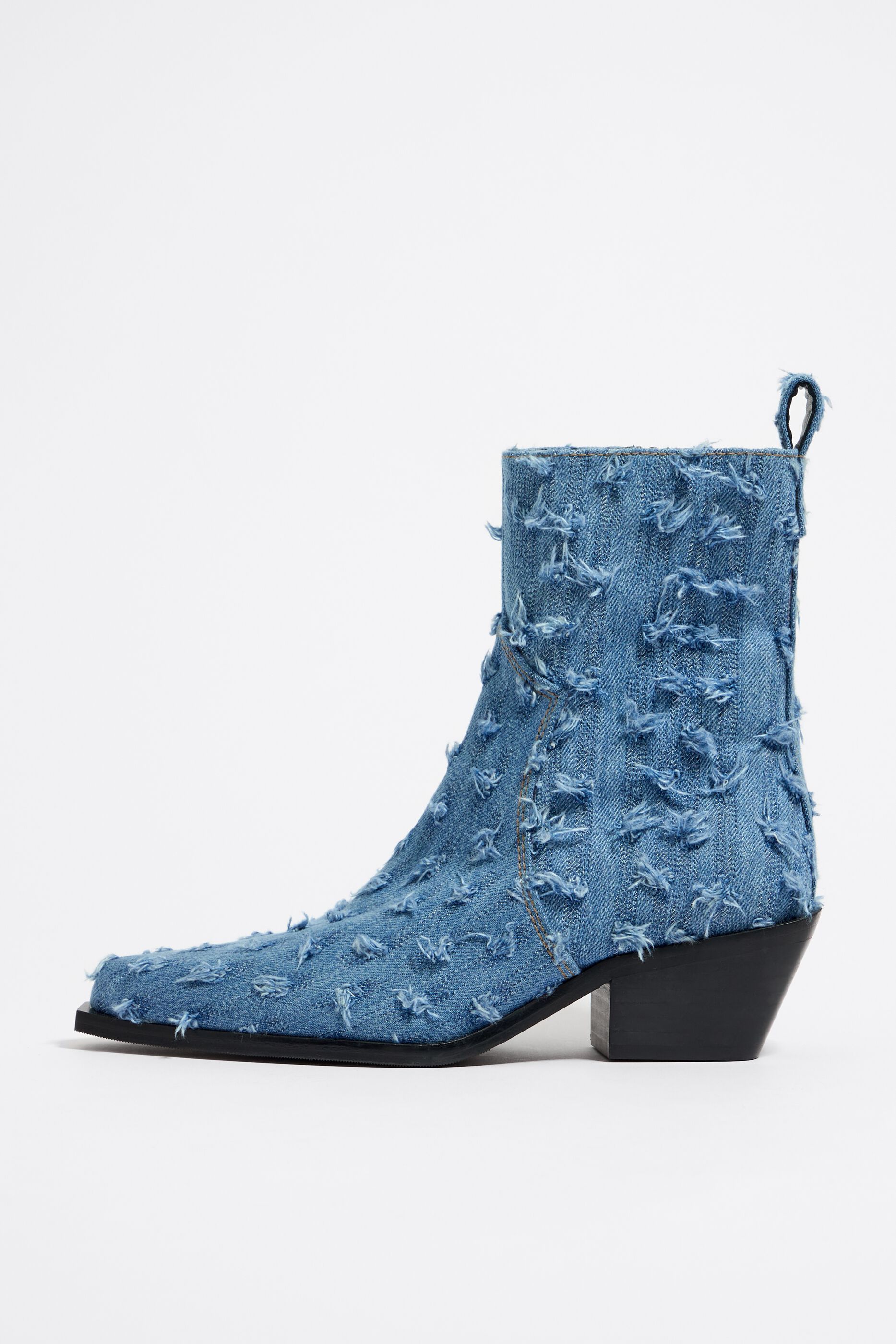 Blue denim cowboy boot